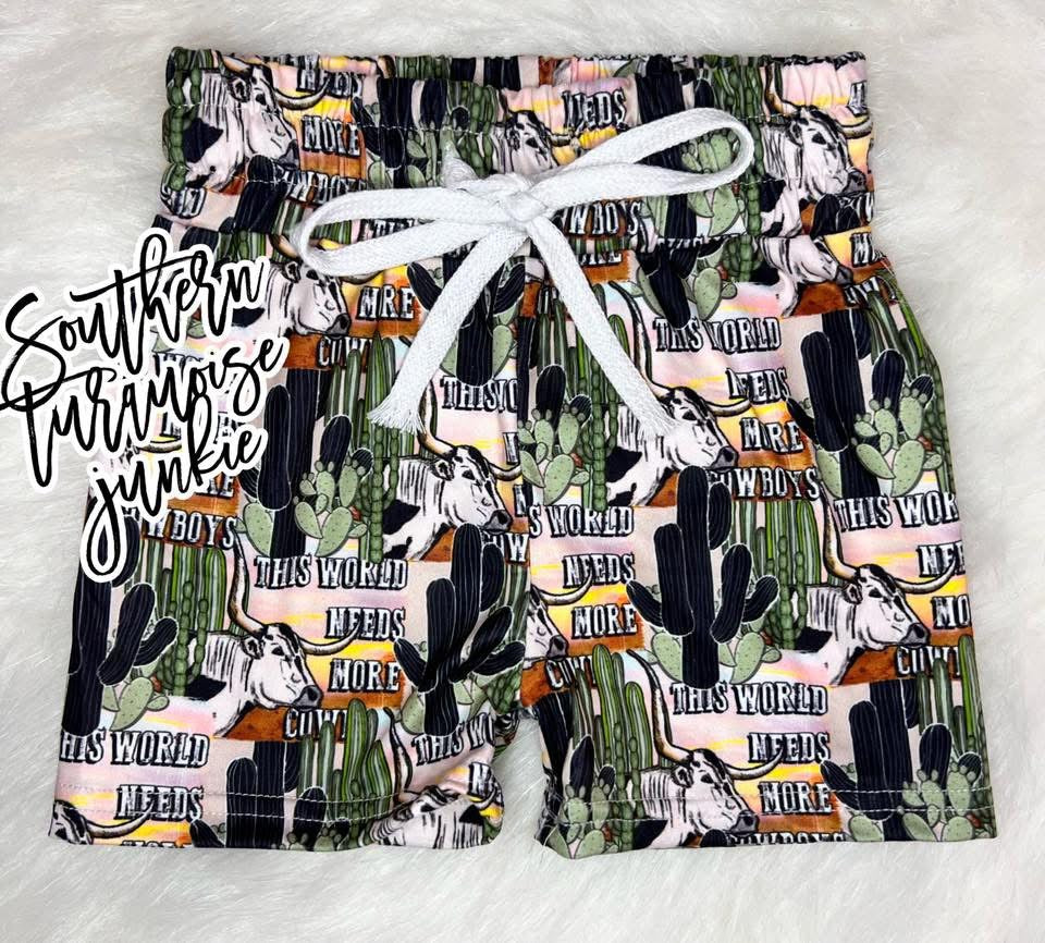 THE WORLD NEEDS MORE COWBOYS SHORTS 5/6